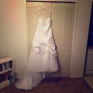 Satin strapless wedding gown.