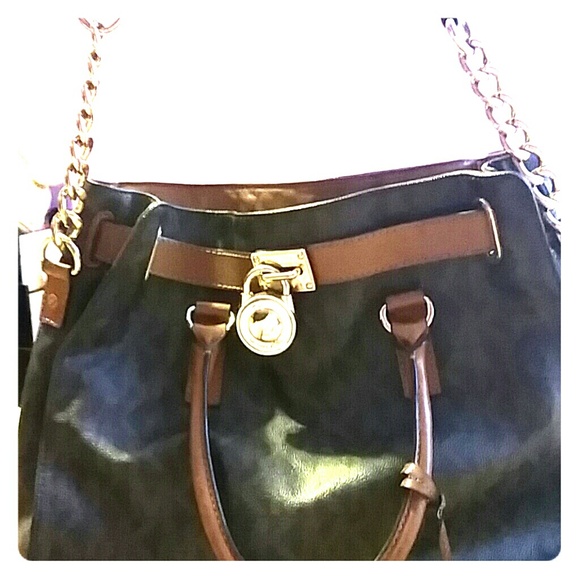 A large and original **Authentic**MK logo bag.