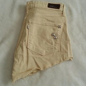 Yellow cutoff levis shorts