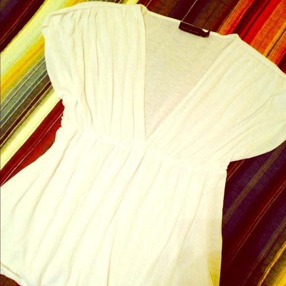 Flattering top with empire waist.