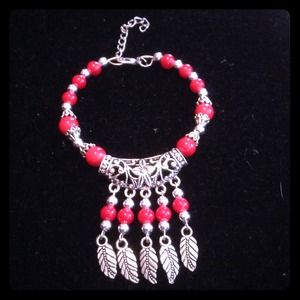 BUY 2 GET 3 FREE! Red & silver bracelet.