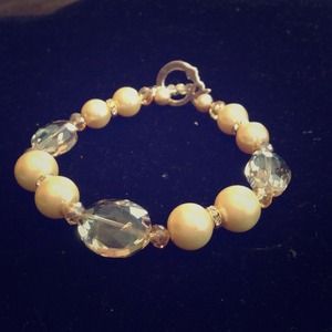 Silver, gold & oyster bracelet with snake toggle.