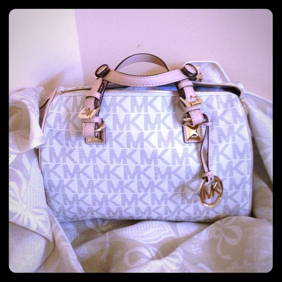 Michael Kors Grayson and neverfull trade.