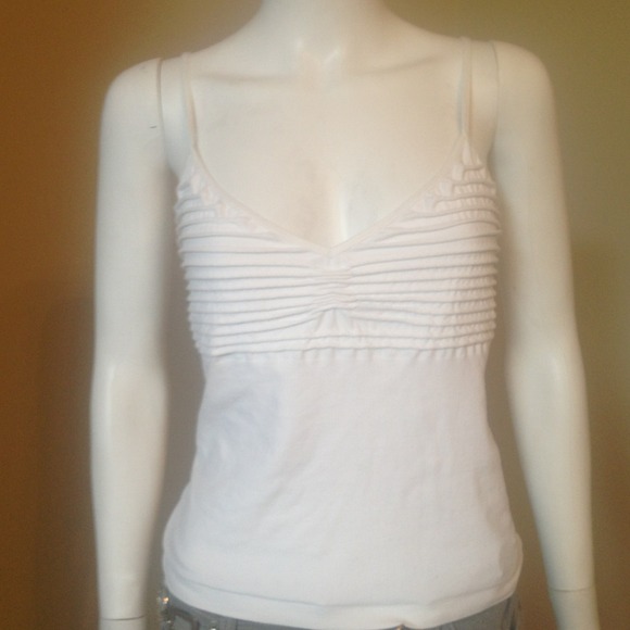 White tank . W ribbed upper chest area v neck