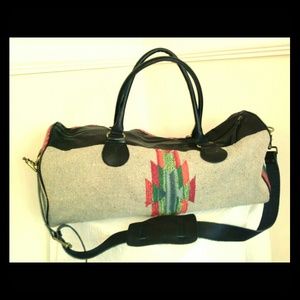 Duffle Bag SIZE/ MEASUREMENTS:20"L x 10"W