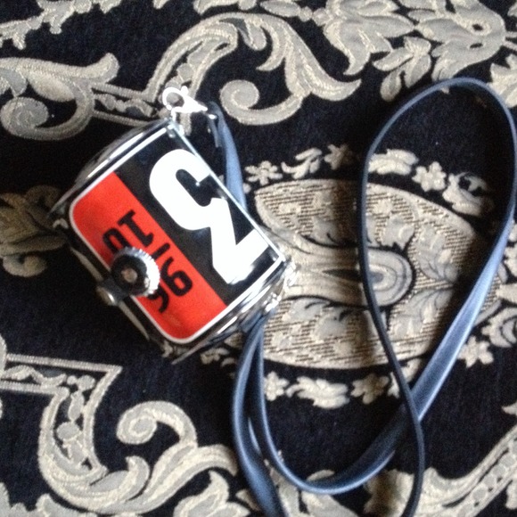 Black metal license plate purse.