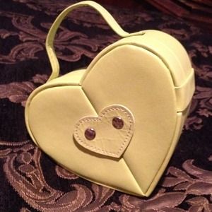 Small lime green heart shaped bag.