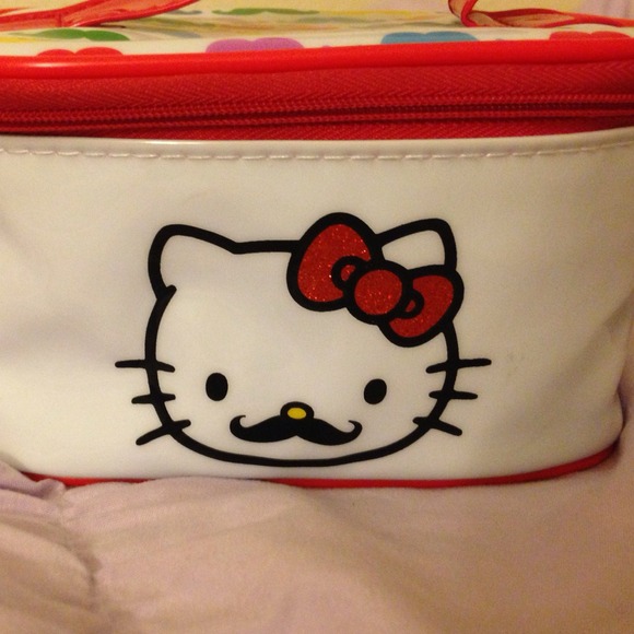 Hello kitty case with free nail polishes