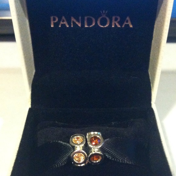 Pandora Charm " Champagne lights and orange bead