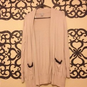 long beige cardigan.