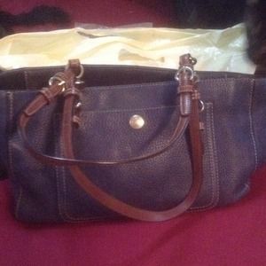 Leather Coach purse/adjusted cost.