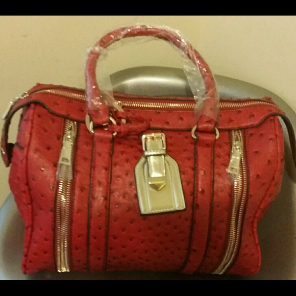 Red alligator skin handbag $$ SOLD