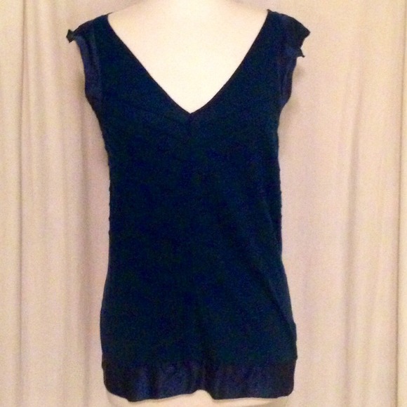 Dark teal top with silky sleeves and hem