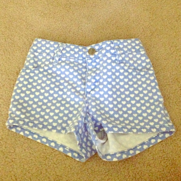 Blue shorts with white heart pattern