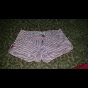 Pink seersucker shorts.