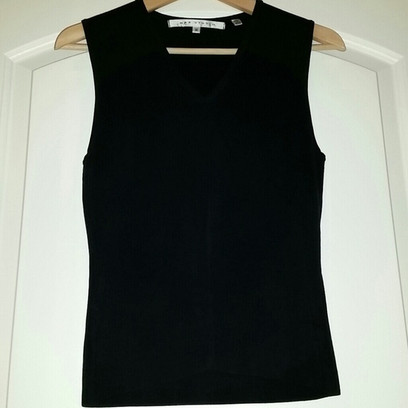 Wardrobe essential. . Black sweater like tank