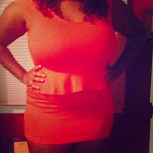 Orange body con peplum dress