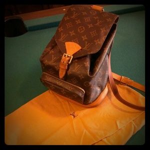 Louis Vuitton backpack purse with original bag