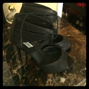 Black shoes, snake-like skin