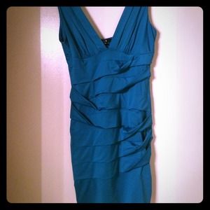 Blue fitted dress will negotiate