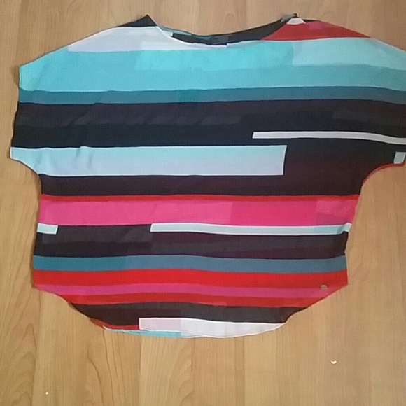 A loose fitted multi colored shirt
