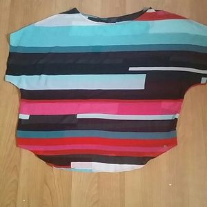 A loose fitted multi colored shirt