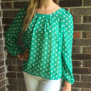 Green and white polka dot shirt