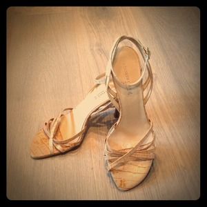 Pair of nude strappy Kenneth Cole heels.