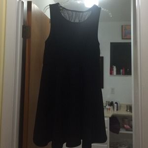 Black dress. Sheer lace skull on the back.