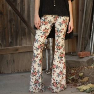 Sold Brandy Melville floral bell bottoms -OSFM
