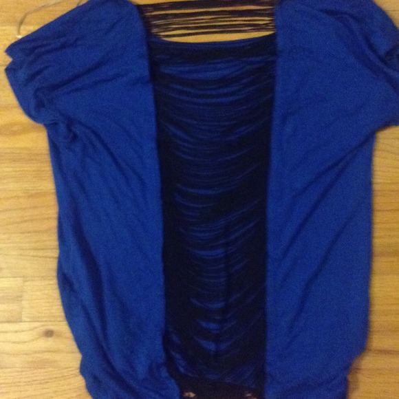 Blue top with open back slashing