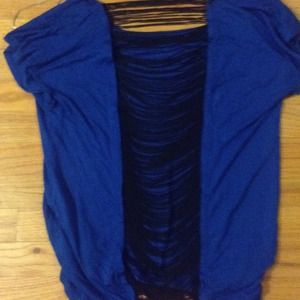 Blue top with open back slashing