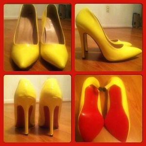 Yellow pumps with red bottoms