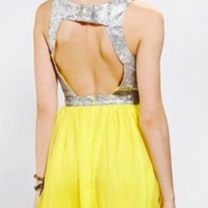 Pretty yellow an silver dress!