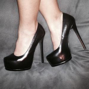 Black leather pumps w/ hidden platform