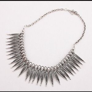 Beautiful bib necklace with leaf tribal design