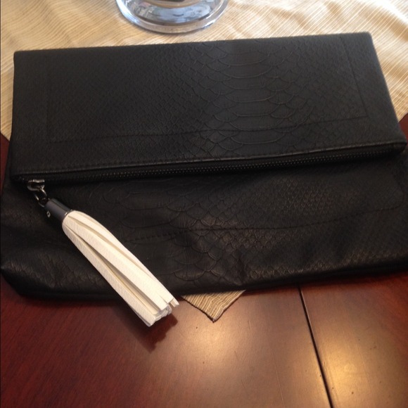 Black clutch with white tassel