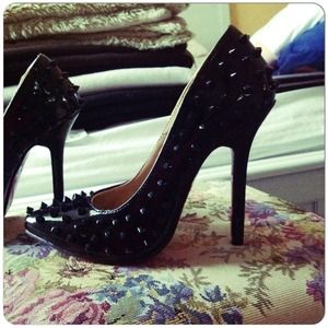 Red sole Christian louboutin spiked black pigalles