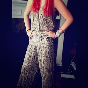 Printed romper size Large. Brand new with tags.