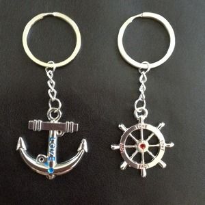 Boat anchor and steering wheel keychains.