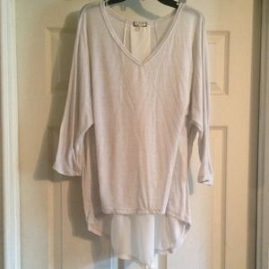 Cute top, with sheer center back.