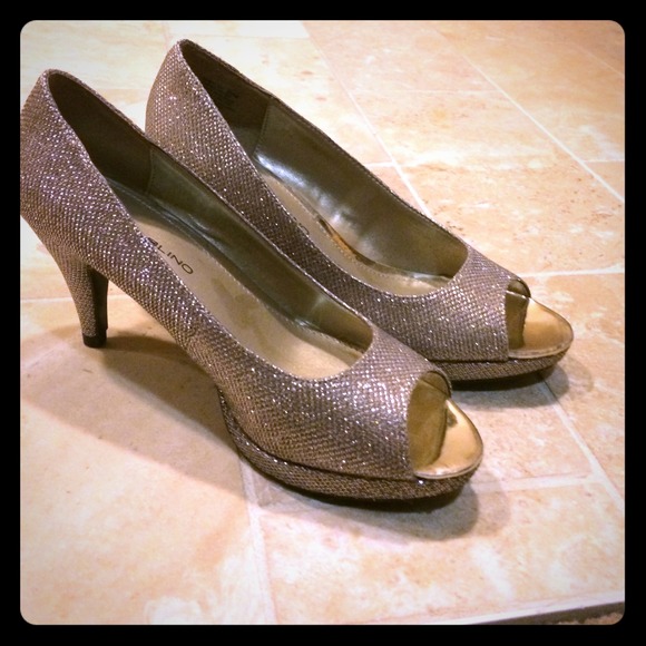 Silver peeptoe heels.