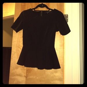 Black peplum top.
