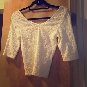 Stretchy cream crop top.