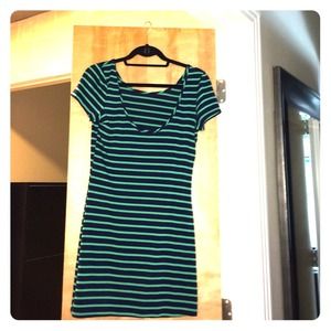 Green and navy fitted dress.