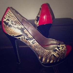 Jessica Simpson, platform peep toe.. Snakeskin