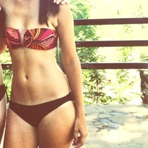 Red/black/orange bathing suit top