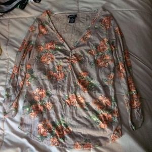 Floral shirt with Lacey back. Never worn
