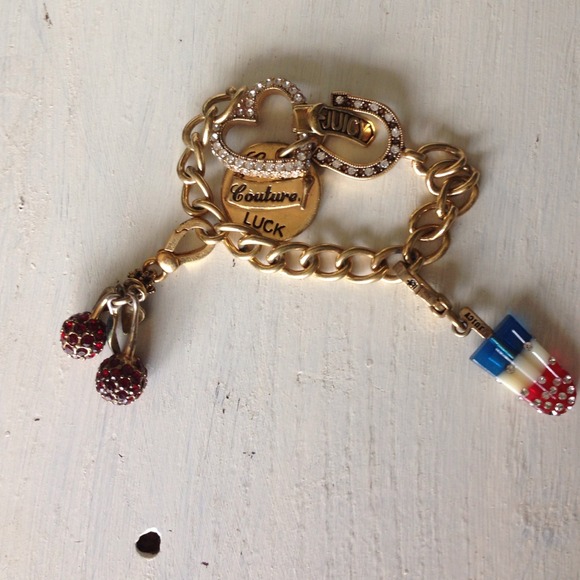 Juicy Couture Charm Bracelet. Mostly displaying