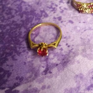 10K gold ring with lab created ruby stone!